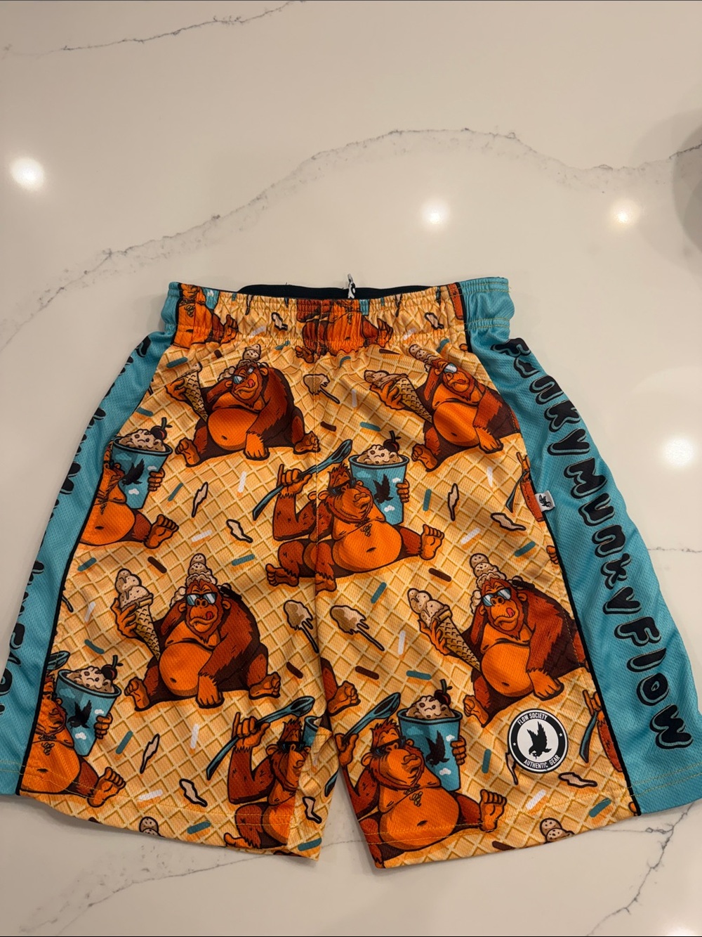 Kids Orange Cartoon Bear Swim Shorts with Blue Side Panels